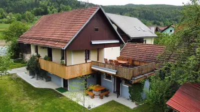 an aerial view of a house with a roof at Apartments in Stari trg ob Kolpi - Süd-Ost Slowenien 42908 in Stari Trg ob Kolpi