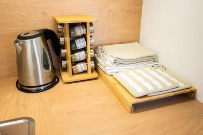 a coffeemaker sitting on a counter next to a coffee maker at APARTMENT 396 in Ljubljana