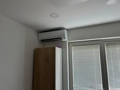 a room with a ceiling fan and a window at Platinum Bled in Bled