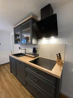 a kitchen with a sink and a counter top at Ami's House Castle View in Bled