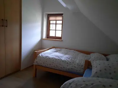 a bedroom with two beds and a window at Holiday home in Semic Kranjska Krain 42896 in Semič