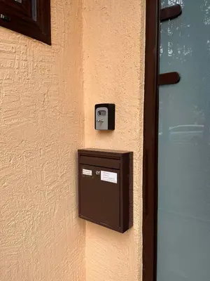 a mail box on the side of a wall at Apartment ARSO in Velenje