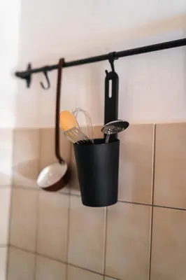 a kitchen utensils in a hanging basket in a bathroom at Country House Sveta Ana in Stari Trg pri Ložu
