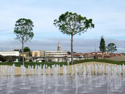 a fountain with a city in the background at Apartma Qbed in Gračišče