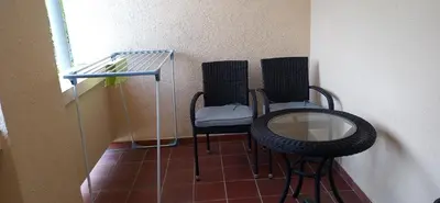 a small room with two chairs and a table at Apartma Rogaska riviera in Rogaška Slatina