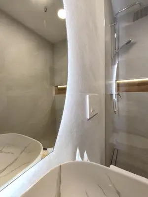 a bathroom with a shower and a sink and a tub at Boutique rooms by Petrič winery in Dobravlje