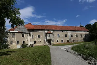 a large stone building with a red roof at Rooftop Home With Whirlpool & Sauna - Happy Rentals in Trebnje