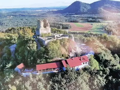 an aerial view of a house on a hill at Glamping with a view in Smlednik