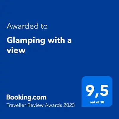 a blue screen with the text awarded to gambling with a view at Glamping with a view in Smlednik