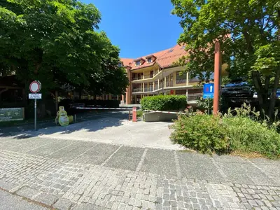 an empty street in front of a building at Apartment above Lake Bled in Bled