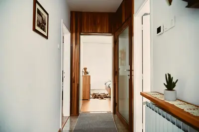 a hallway with a door leading into a room at Schneider Living in Bovec