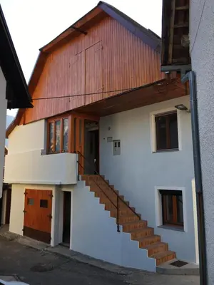 a white house with a red roof at Pri Zajcu in Bovec