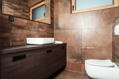 a bathroom with a sink and a toilet at Wine paradise Glavinič in Miklavž pri Ormožu