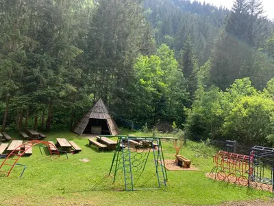 a park with a playground with a play set at Črjanski Raj in Črna na Koroškem