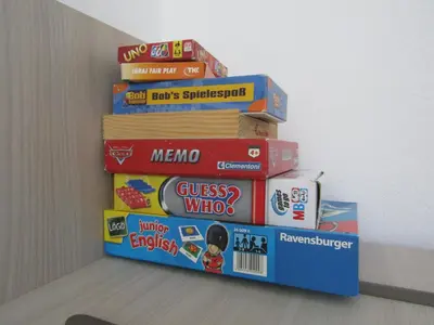 a stack of books stacked on top of each other at Apartma Melinc in Bovec