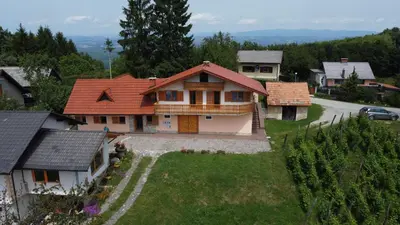 an aerial view of a house with a yard at ApartmaVid in Podbočje