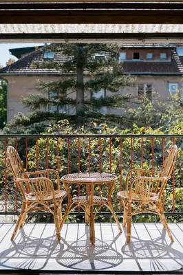two chairs and a table on a balcony at Ljubljana C17 4-Bedroom Private Row House with Garden and Parking in Ljubljana