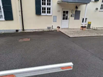 a driveway in front of a house with a door at VILLA GOLF Crystal Drop Apartment in Rogaška Slatina