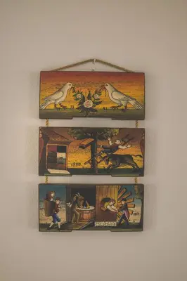 a group of pictures hanging on a wall at Apartment Amak with free onsite parking in Bovec