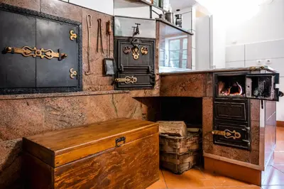 a kitchen with a stove and an oven at Domačija Gačnik in Idrija