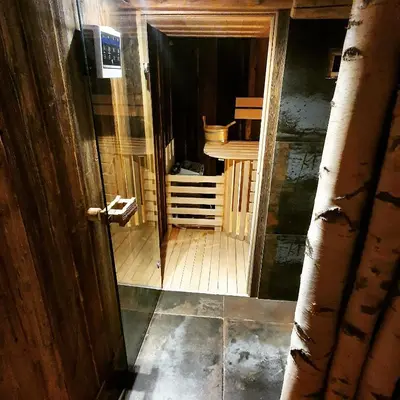 an open door to a room with a wooden floor at Chalets Toplak in Sveti Duh na Ostrem Vrhu