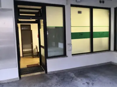 an open door of a building with glass windows at Apartman Alja, Kranjska Gora in Kranjska Gora