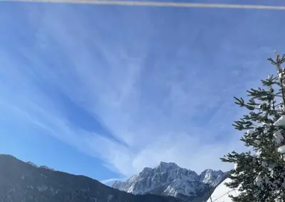 a view of a mountain range with a blue sky at Apartman Alja, Kranjska Gora in Kranjska Gora
