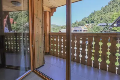 a view from the balcony of a house at Apartments Mulej in Bled