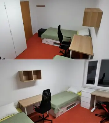 a room with two beds and a desk and chairs at Apartma VAL - Maribor in Maribor