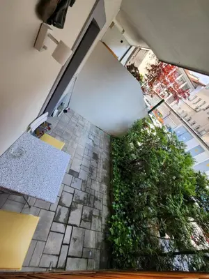 an overhead view of a garden from a building at Apartments Old Town in Ljubljana