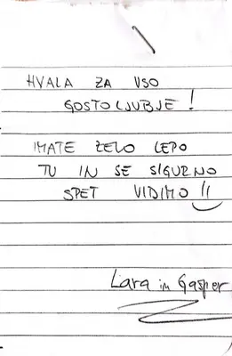 a sheet of lined paper with handwriting on it at Natur apartma Rudi in Begunje na Gorenjskem