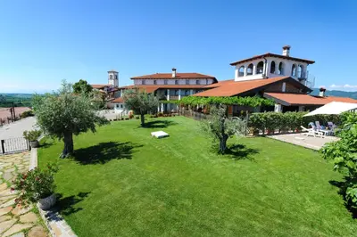an overhead view of a yard with a building at Belica Bed and Breakfast in Dobrovo