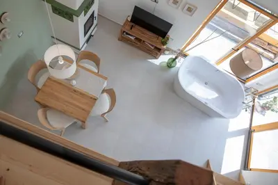 an overhead view of a bathroom with a toilet and a sink at Hiska B&N Podlehnik in Podlehnik