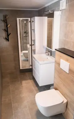 a bathroom with a toilet and a sink at Prima Countryside Apartments in Žirovnica