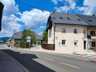 a building on the side of a street at Corner House Apartments near Lake Bled in Radovljica