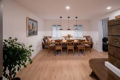 a dining room with a table and chairs at House Leska in Kranjska Gora