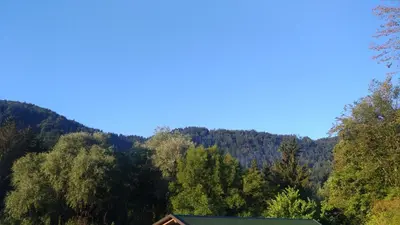 a view of a mountain from a house at Apartma Lara in Bled