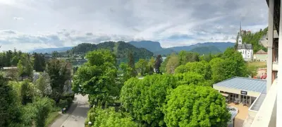 a view of a town with trees and a building at Apartment Lucy, Bled in Bled