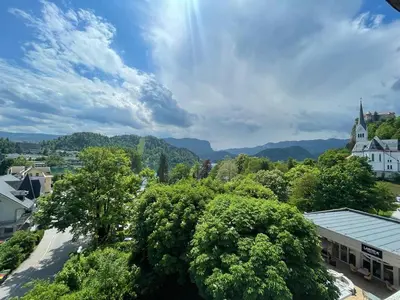 a view of a town with trees and a building at Apartment Lucy, Bled in Bled