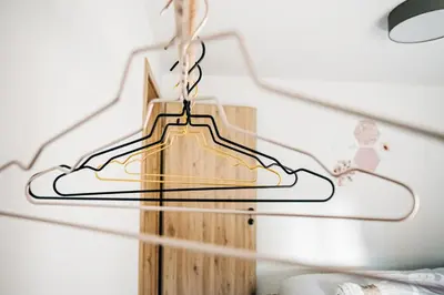 a wooden sign hanging from a ceiling at Štekner house Apartma in Ljubno