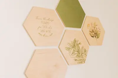 a picture of a honeycomb with flowers on it at Štekner house Apartma in Ljubno