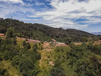 an aerial view of a house on top of a hill at Eko Pony Ranch Ogrizek in Podčetrtek