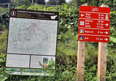 a sign that is next to a map at Green Garden House in Zreče