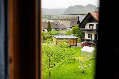 a view from a window of a town with houses at Turistična kmetija Grabnar in Bled