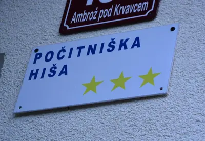 a sign that says potritiskisskiss sidx sidx sidx sidx sidx sidx at Hiša v mesečini - Moonlight house in Cerklje na Gorenjskem
