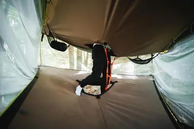 a person is inside of a tent at Tents resort Posestvo SONČNI RAJ in Maribor