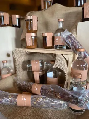 a group of bottles of alcohol on a table at Brunarica Macesen Smogavc in Zreče