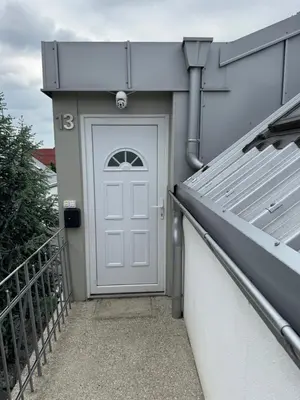 a door on the side of a building at NEW GUEST HOUSE 13 in Maribor
