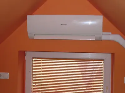 a ceiling mounted air conditioner in a room with a window at Valant Apartment ID I00070 in Bled