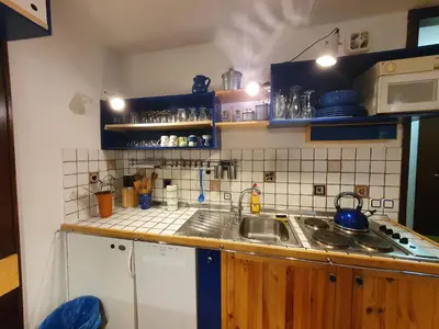 a kitchen with a sink and a counter top at M & M apartment Krvavec in Cerklje na Gorenjskem
